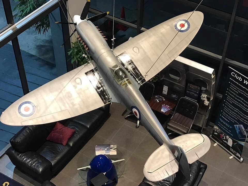 MK XIX PR Spitfire suspended majestically as a centre piece  in the Club Lounge in Singapore Airport.